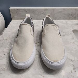 Marc Fisher 7.5M Slip-On Canvas Shoes - Cream. slight glue stain on tip.